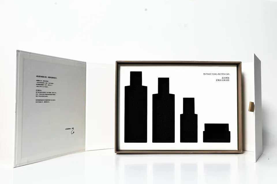 Rigid gift box with insert, open