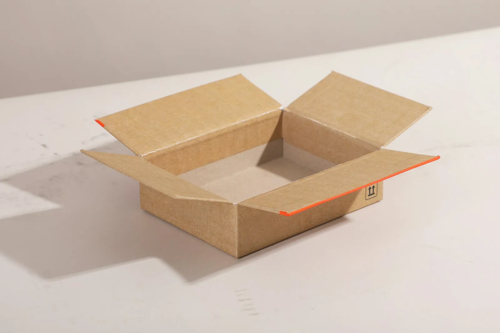 Open corrugated shipping carton