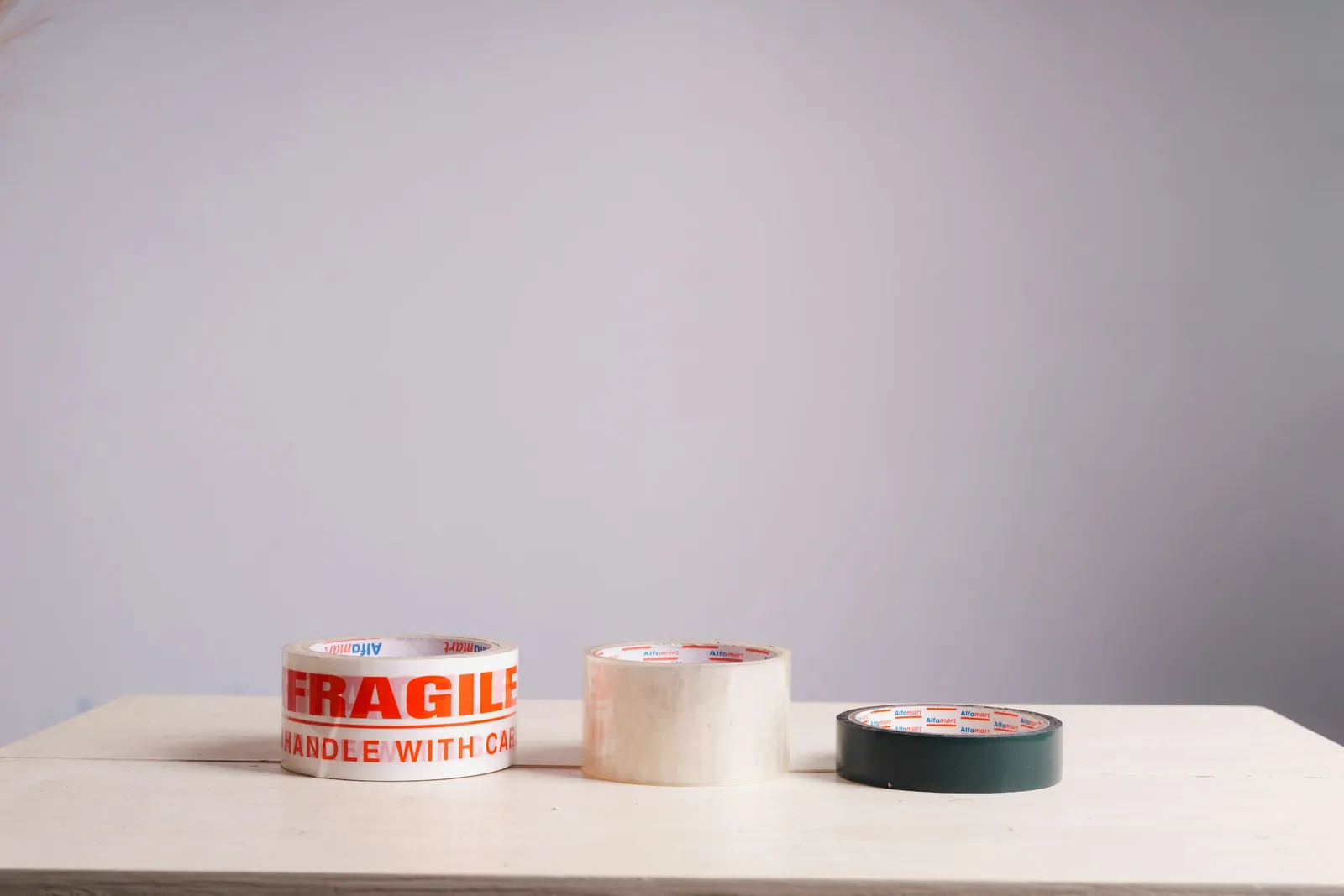 Clear and printed "Fragile" sealing tape rolls